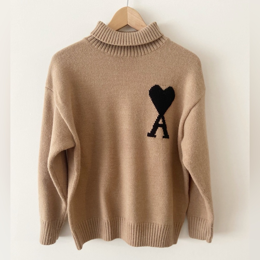 Designer Inspired Tan Sweater with Black Heart Accent